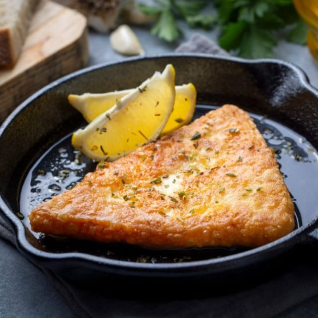 Saganaki Pan Fried Greek Cheese.