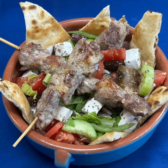 Large Greek Salad With 2 Pork Skewers.
